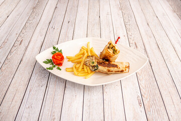 Chicken Wrap Ingredients, Cooked Chicken Romaine Lettuce, Roma Tomatoes, Red Onion, Shredded Cheese, Chicken Fil A Sauce or BBQ Sauce