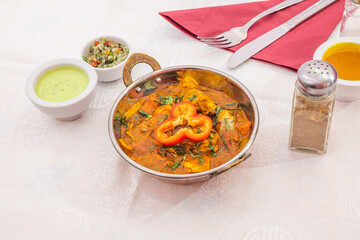 Chicken dopiaza is an easy tomato-based curry over medium heat with delicious sweet notes of caramelized onions and cream. Serve with cooked basmati rice or parathas.