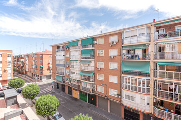 Facades of urban family dwellings in a suburb of Madrid