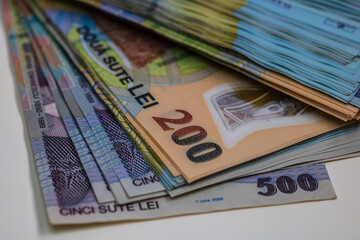 Closeup shot of LEI Romanian banknotes - inflation and economy concept