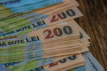 Closeup shot of LEI Romanian banknotes - inflation and economy concept