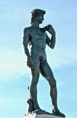 Fototapeta na wymiar Bronze copy of Michelangelo's David made in 1800 by arch. Poggi