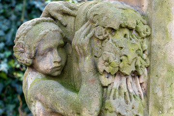 Naklejka premium Historic Statue on the mystery old Prague Cemetery, Czech Republic
