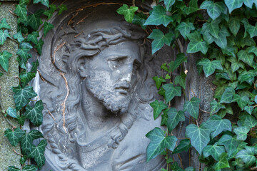 Historic Statue on the mystery old Prague Cemetery, Czech Republic