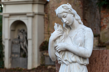 Historic Statue on the mystery old Prague Cemetery, Czech Republic
