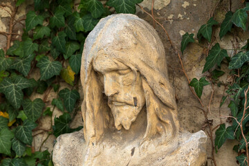 Historic Statue on the mystery old Prague Cemetery, Czech Republic