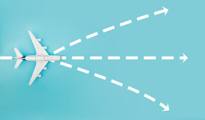 Fototapeta premium Plane and white arrows