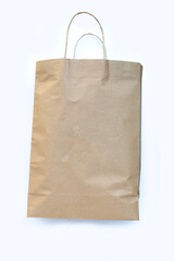 Brown paper bag on white background.