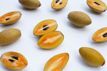 Fresh sapodilla fruit on white background