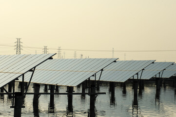 Fototapeta premium Solar panels, photovoltaic power transmission. Alternative power sources, sustainable resource concept
