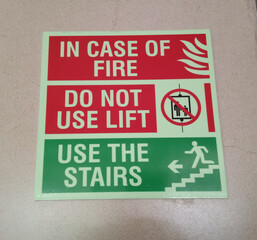 Information of safety worning banner, in case of fire do not use lift use the stairs