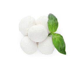 Fototapeta na wymiar Delicious mozzarella cheese balls and basil on white background, top view