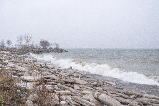 Waves pummel the shoreline in Colonel Samuel Smith Park in Etobicoke (Toronto), Ontario during a winter snowstorm.