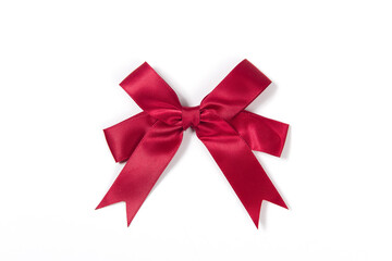 shiny red satin bow isolated on white background