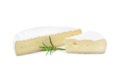 Tasty cut brie cheese with rosemary on white background