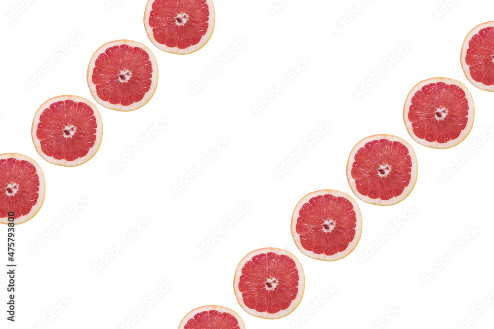 Poster white background for copy space with grapefruit slices on the frame diagonally