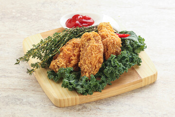 Crispy chicken wings with tomato ketchup