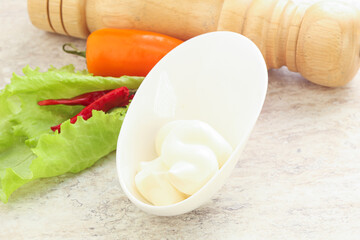 Organic mayonnaise sauce in the bowl
