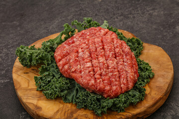 Raw beef burger cutlet for cooking