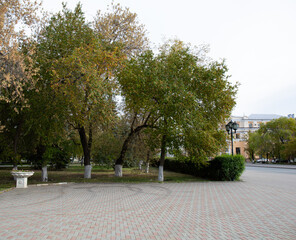 A beautiful path on the central square of the city of Tyumen in autumn