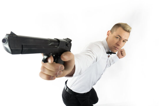 Man whith pistol, Brave tough man aiming a gun on a white background