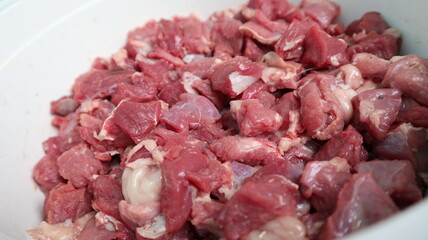 Preparation of cut meat for satay