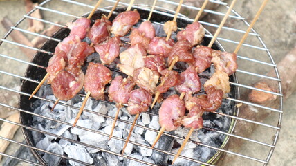 The satay is being grilled