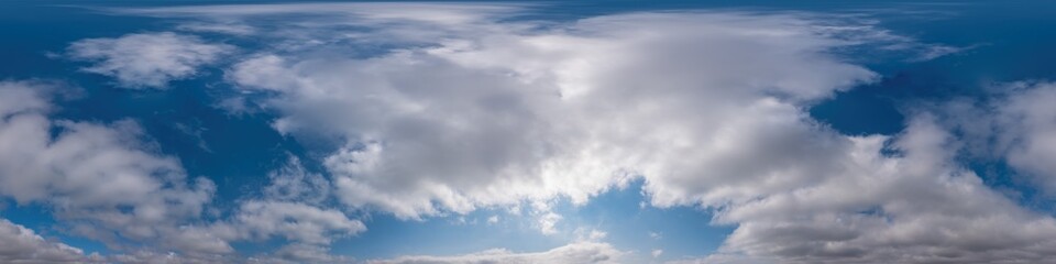 Blue sky panorama with Cirrus clouds in Seamless spherical equirectangular format. Full zenith for use in 3D graphics, game and editing aerial drone 360 degree panoramas for sky replacement.