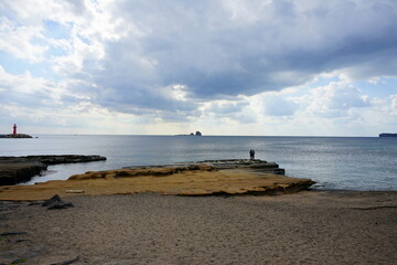a beautiful seaside view with charming clouds