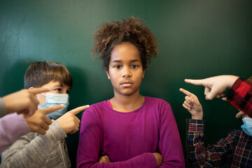 Schoolchildren discrimination and harassment for different race and color skin. 