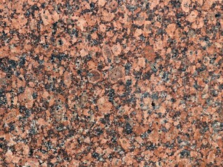 marble texture with red and black spots in natural stone pattern, polished mineral as material for industrial use, smooth surface of treated granite for interior design