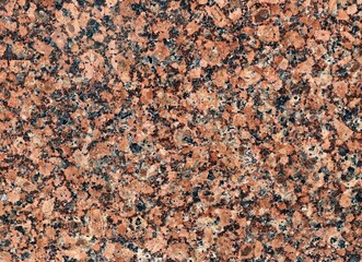 marble texture in red and black tones with random spots in the pattern, granite polished smooth background for use in design, processed natural stone full frame