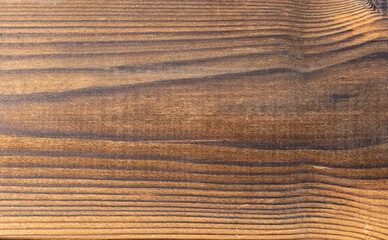 Smooth surface of a brown wood board