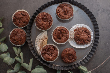 Chocolate muffins. Sweet dark cupcakes with chocolate 