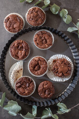 Chocolate muffins. Sweet dark cupcakes with chocolate 
