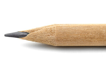Macro photo of a sharpened pencil on a horizontal position, isolated on a white background.