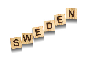 Sweden, word on wooden blocks. Isolated on a white background.