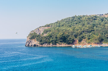 view from the sea, budva coast montenegro, adriatic sea and balkan mountains