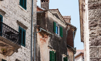 Ancient street, historical building in the old town of Kotor, Montenegro, Europe, Adriatic sea and mountains