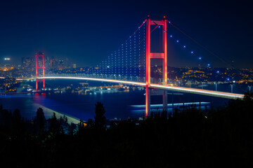Naklejka premium Istanbul night. Istanbul background photo at night with Bosphorus Bridge