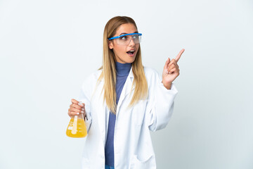 Young scientific woman isolated on white background intending to realizes the solution while lifting a finger up