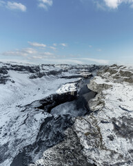 Top view of snow covered deep canyon