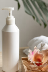 Treatment bottle with dispenser and Thai Orzidea.