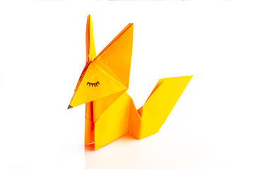 Naklejka premium A fox origami with white background
