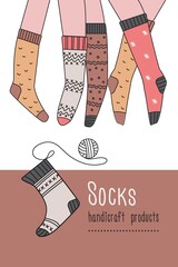 Banner knitted socks, handmade knitwear. Feet in socks, a sock with a skein of buckle. A decorative element for your design.