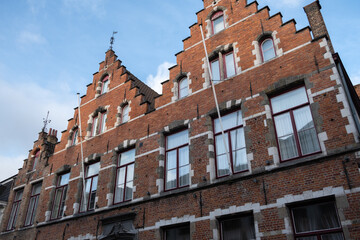 Red brick facade of a building, in Bruges