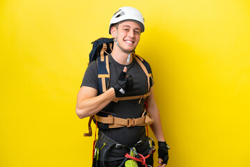 Young rock climber Brazilian man giving a thumbs up gesture