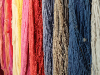 close up of colorful yarn at The Noble House, Mueang Nan district, Nan, Thailand. 