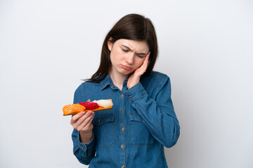 Young Russian woman holding sashimi isolated on white background with headache