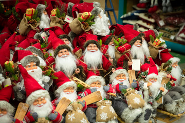Lot of Santa Claus toys in marker at Christmass holidays